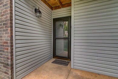 Private Covered Entry With Storm Door