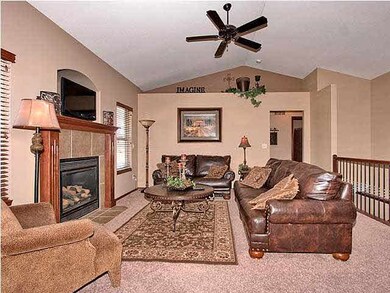 OPEN LIVING AREA WITH VAULTED CEILINGS AND CEILING