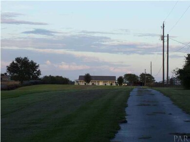 Long road to the house offers plenty of privacy.