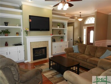 Another view of the built-in bookcases and firepla