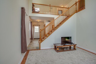 Dramatic Staircase to Upper Level