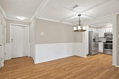 Entry Hall and dining room.  Lots of closet space 