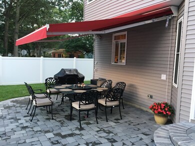 pool patio with retract awning