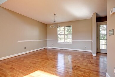 Separate dining room overlooks private backyard!