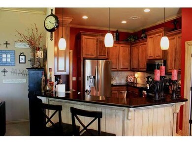 Kitchen. Gorgeous bar with granite and stain over 