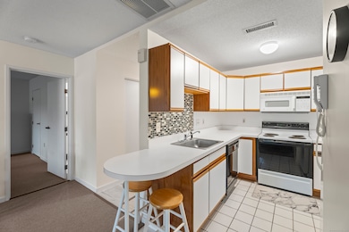 Eat in kitchen with ample storage.