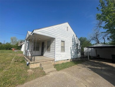 View of front of home featuring concrete driveway,