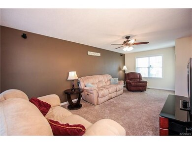 Family room with upgraded thick pile carpet. Pre-w