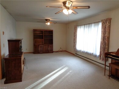 Large living room, ceiling fans, gas fireplace is 
