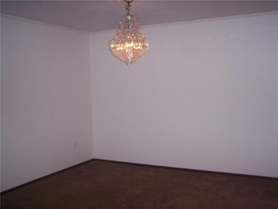 Dining Room. Dining room with lovely chandelier.