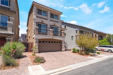 View of front of house featuring stucco siding, an