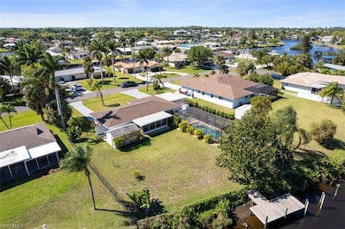 Aerial perspective of suburban area with a large body of water
