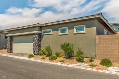 View of side of home with stucco siding and a garage