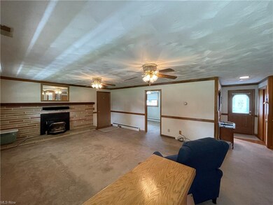 Family Room with pellet burning fireplace.