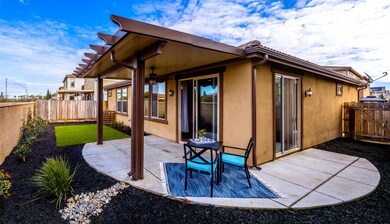 This backyard, with it's covered patio, imitation 