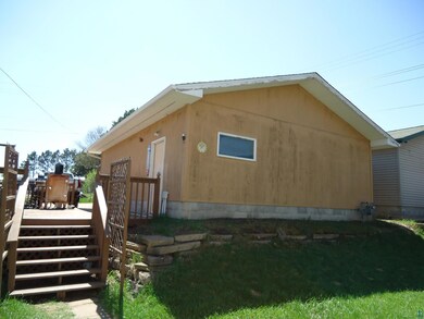 View of home's exterior with a deck