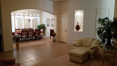 Living room opens to formal dining area