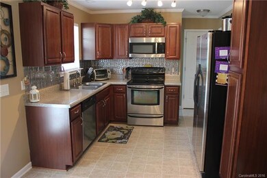 Stainless steel appliances and beautiful backsplas