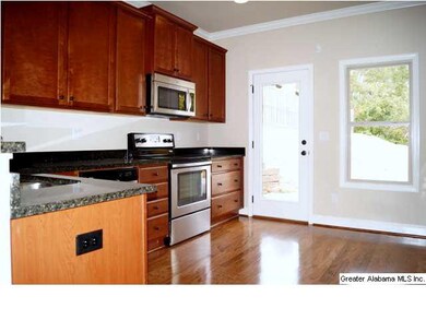 Another view of kitchen, floor upgraded to hardwoo
