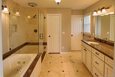 Updated En Suite with Jet tub, frameless glass sho