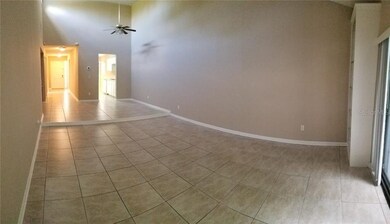 LIVING ROOM LOOKING AT DINNING ROOM & KITCHEN