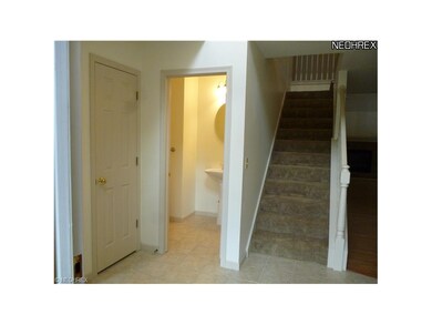 Entrance area from front door. Tiled.
