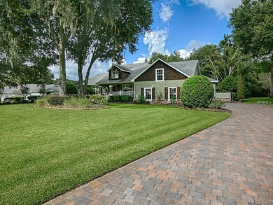 Wonderful paver driveway and stone accents on the 
