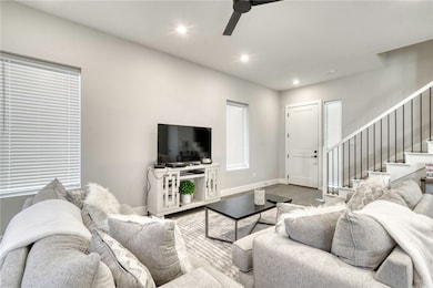 Living area featuring recessed lighting, a ceiling