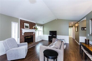 Beautiful wood-burning fireplace is a great focal 