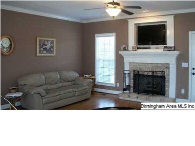 Lots of beautiful maple stained cabinets in this k