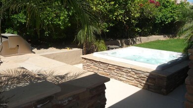 Built-in Electric Spa and BBQ Island !
