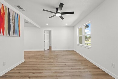 Unfurnished room with light wood-type flooring and