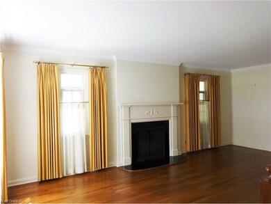 Spacious Formal Living Room with hardwood flooring