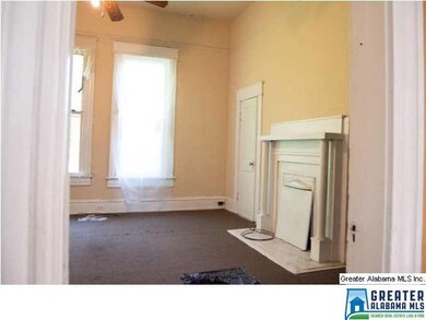 Another bedroom with a fireplace