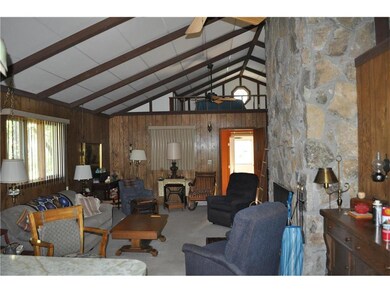 Vaulted Ceiling Stone Fire Place overhead loft
