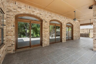 Hute patio area overlooking the treed, half-acre l