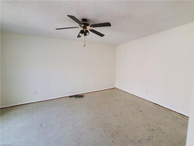 Unfurnished room with ceiling fan
