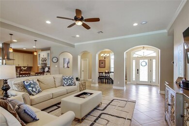 Living room to foyer. Beautiful front door with si