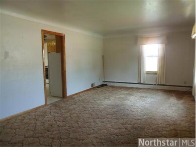 THERE IS HARDWOOD FLOORING UNDER CARPET IN LIVING 