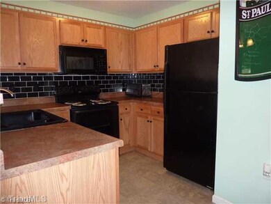 Kitchen. Lots of cabinet space and within one or two steps.