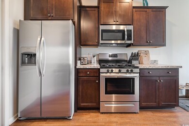 Kitchen featuring light hardwood / wood-style floo