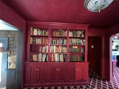 Dining Room/Library with built in book cases, uniq