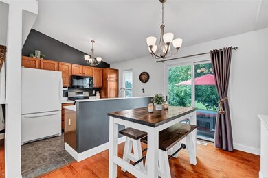Beautiful dining room and kitchen with a sliding door to the patio!