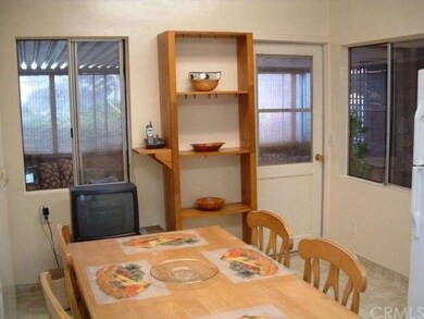 KITCHEN WITJ ACCESS TO ENCLOSED PATIO
