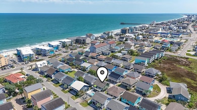 Aerial overview of property's locationwith proximity to beach