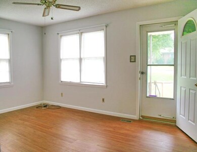 12x16 living room, ceiling fan, laminate floors and house 5yrs ago.