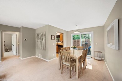 Dining area can fit large table and has sliding do