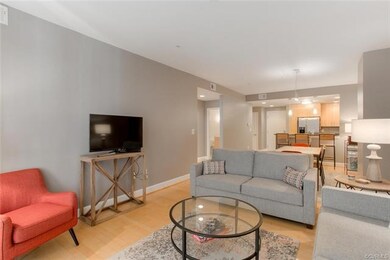 Living Room View to Dining Room and Kitchen! The B