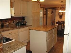 Kitchen with layered pantry.