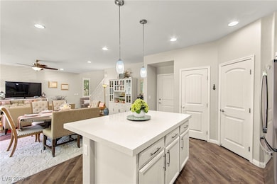 Kitchen featuring freestanding refrigerator, ceili